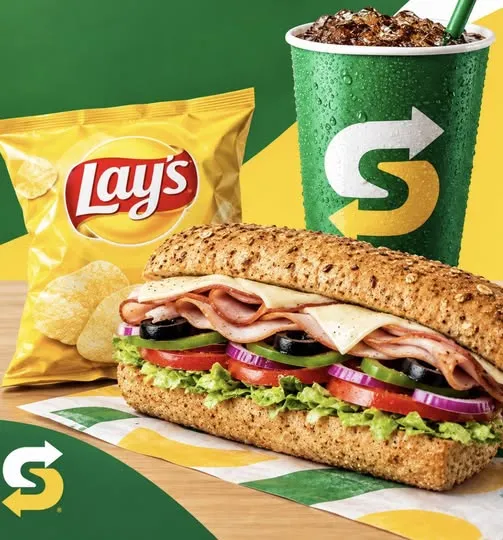 The ultimate meal of the day sorted with a fresh sub, chips, and an ice-cold drink!